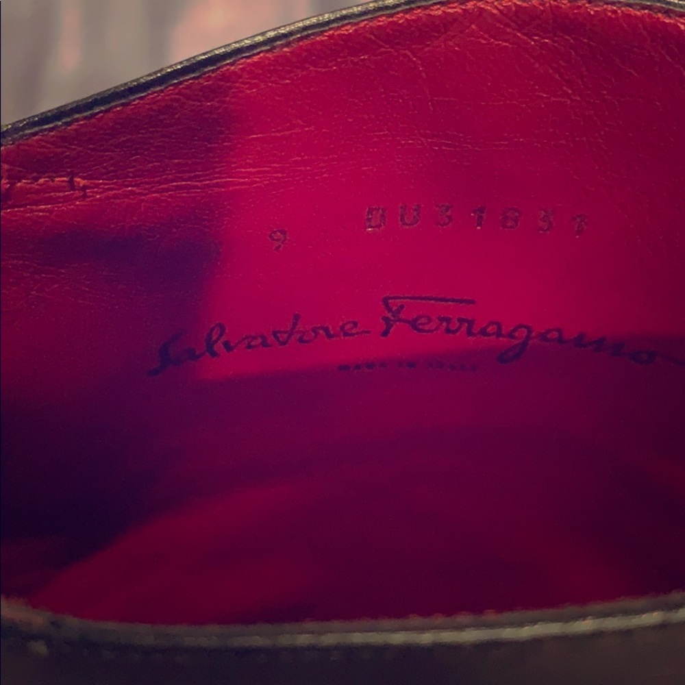 Black knee high Ferragamo boot